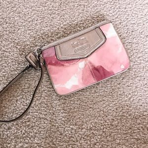 Pink flowered Coach wristlet